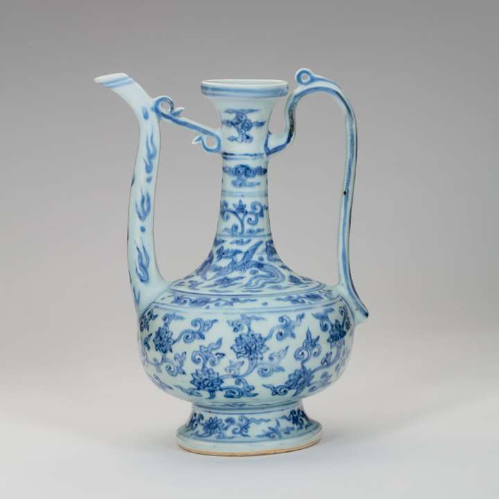 A MING BLUE-AND-WHITE EWER WITH XUANDE MARK 明宣德款青花缠枝莲纹执壶